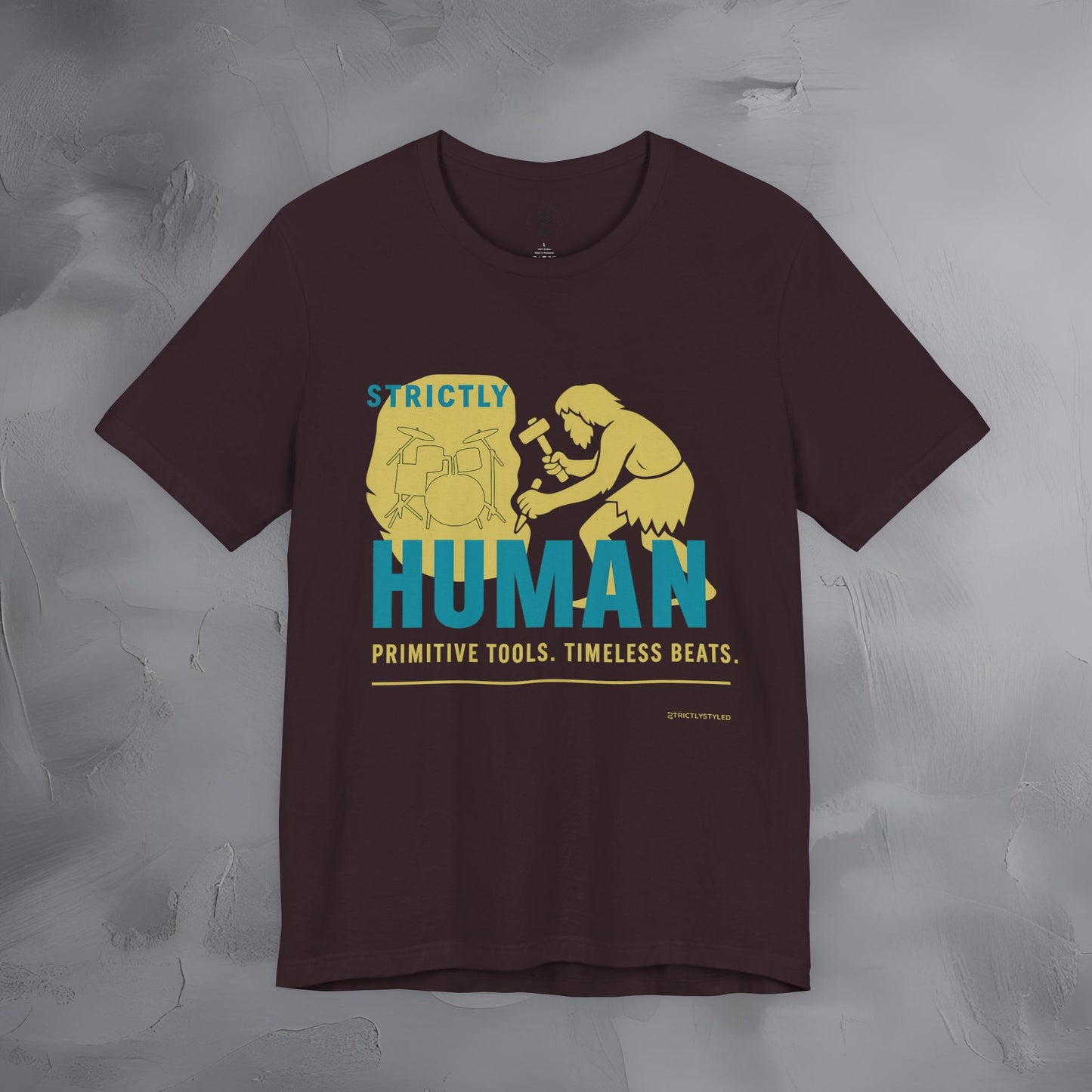 Strictly Human T-Shirt – Drum & Rhythm Graphic Tee - Primitive Tools, Timeless Beats